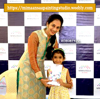 A Girl in Pink dress taking Best Drawing Award in kids category from Art Teacher